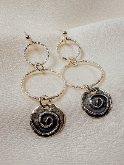 Two Textured Rings and a Spiral Earrings