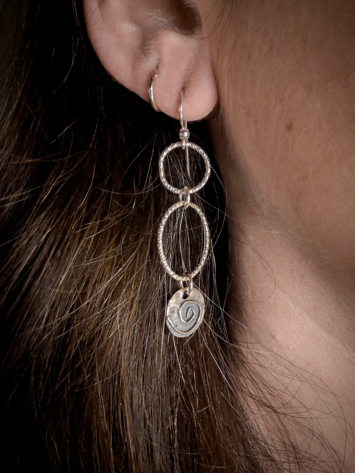 Two Textured Rings and a Spiral Earrings